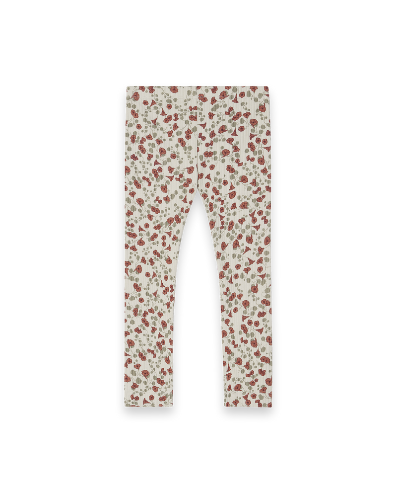 Rückseite.  Leggings mit schönem handgezeichnetem Aufdruck aus weichem Bio-Ripp-Jersey mit glatter Innenseite und weichem Gummibund, mit zarten roten Blumen und Klee auf hellem Hintergrund. 