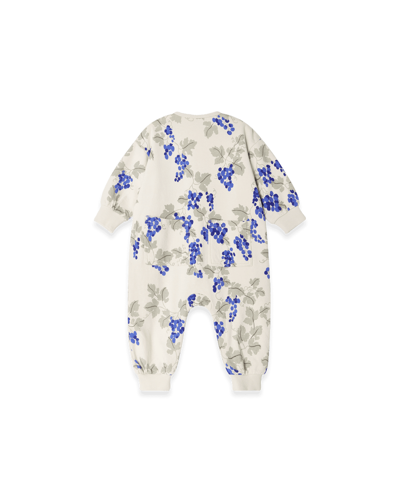 Baby-Onesie aus weicher Bio-Baumwolle mit handgezeichnetem Print, gebürsteter Innenseite, Rippbündchen und Druckknöpfen an Schulter, Schritt & Beinen.

