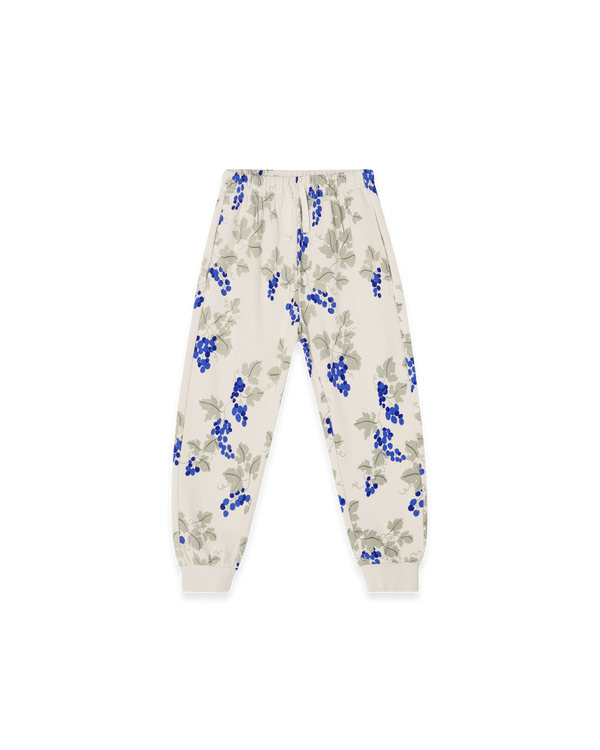 Sweatpants aus Bio-Baumwolle mit handgezeichnetem Print, elastischen Bündchen, verstellbarem Kordelzug-Bund und Seitentaschen – flach liegend fotografiert.