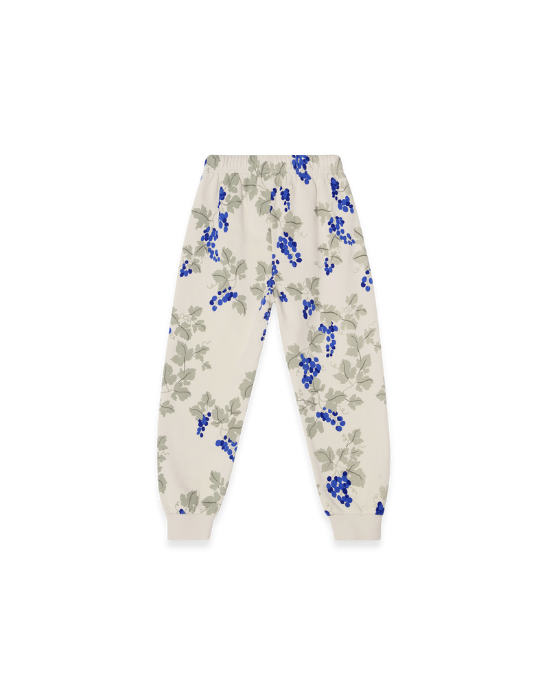 Sweatpants aus Bio-Baumwolle mit handgezeichnetem Print, elastischen Bündchen, verstellbarem Kordelzug-Bund und Seitentaschen – flach liegend fotografiert.