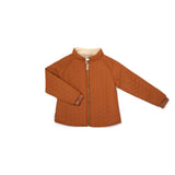 Thermo-Set aus recyceltem Polyester - Junior. Das Thermoset ist ideal unter Regenkleidung. Kind trägt Thermo Anzug beim Spielen. 