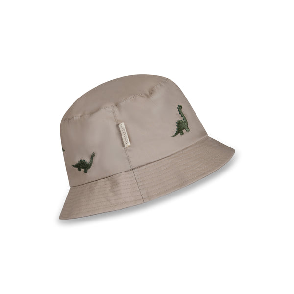 Beiger Baby-Becherhut aus Bio-Baumwolle mit grüner Dino-Stickerei.